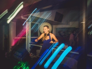 Cairns and Port Douglas DJ Andrea Dancing to tunes at a function